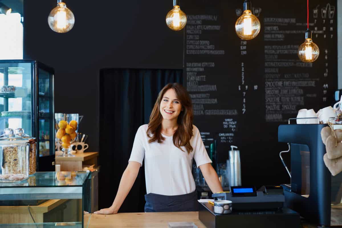 Woman small business owner at counter