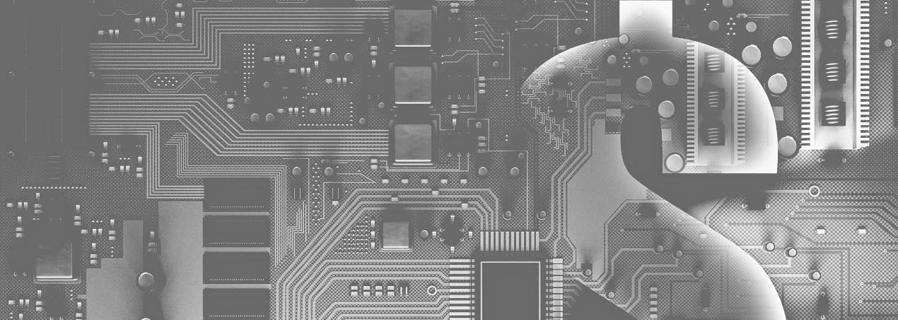Monochrome close-up of a circuit board displaying intricate pathways and electronic components, symbolizing the complexity of modern technology.