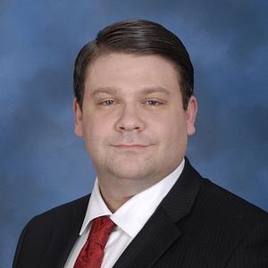 Headshot of Dustin Suttle, MBA, CFP®, CRPC®, AAMS®