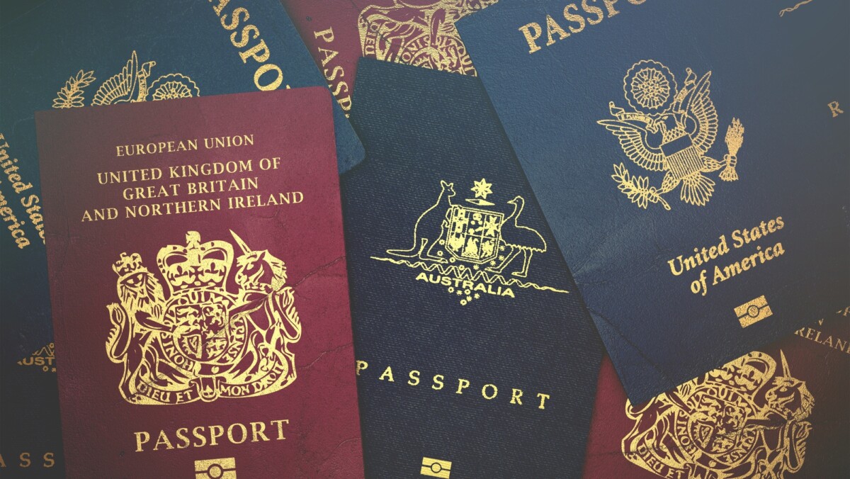 Picture of multiple passports on a table.