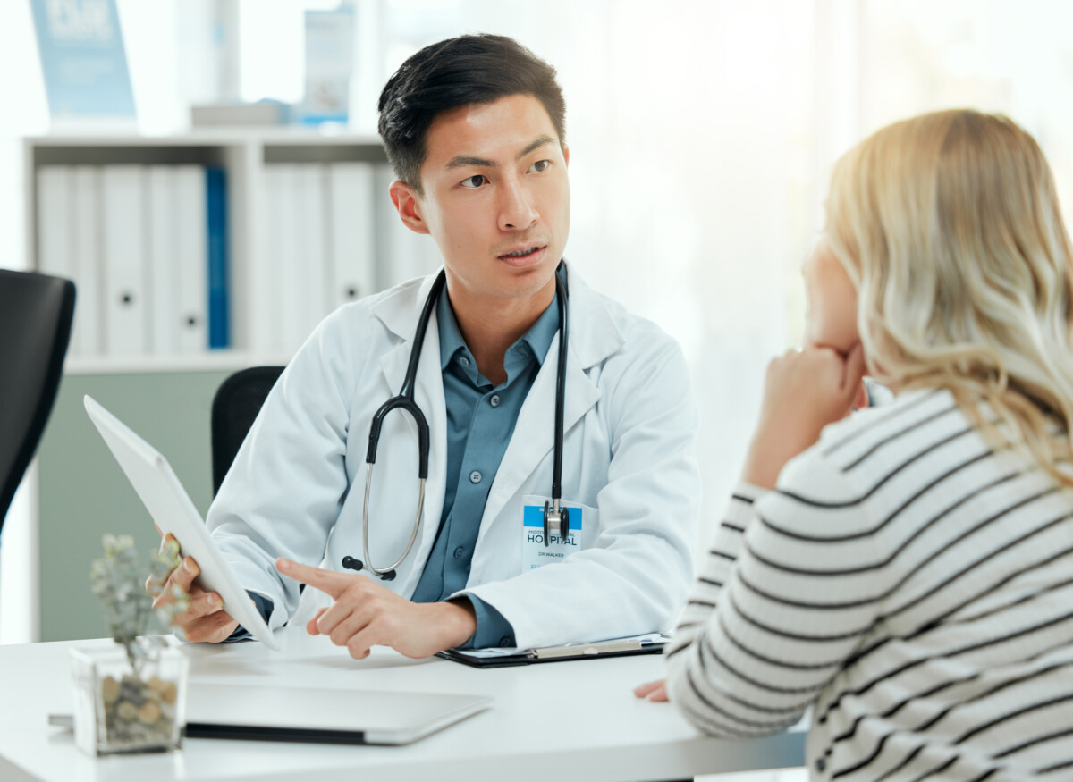 Shot of a doctor during a consultation with a patient in a clinic.