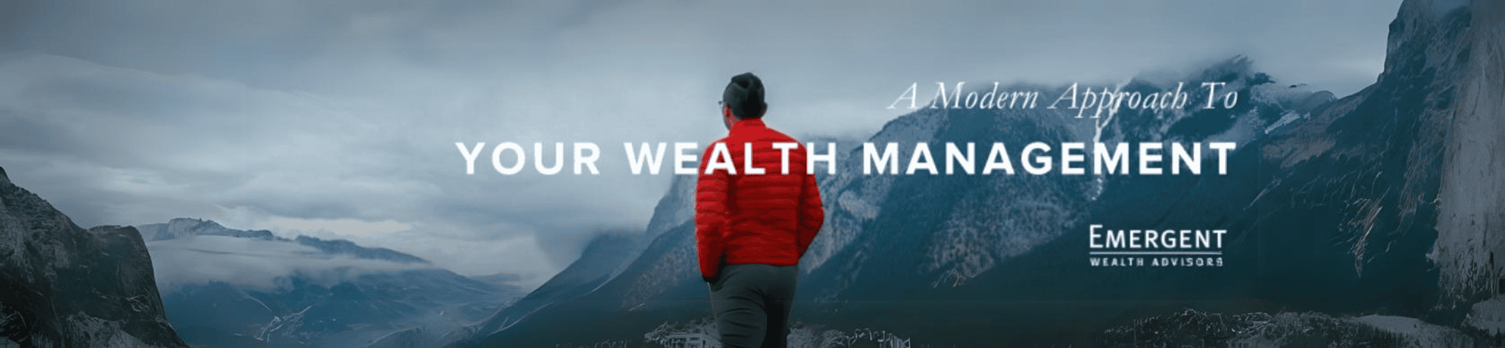 An individual in a red jacket stands gazing at a breathtaking mountainous landscape, symbolizing a visionary perspective, alongside text 'a modern approach to your wealth management - emergent wealth advisors'.