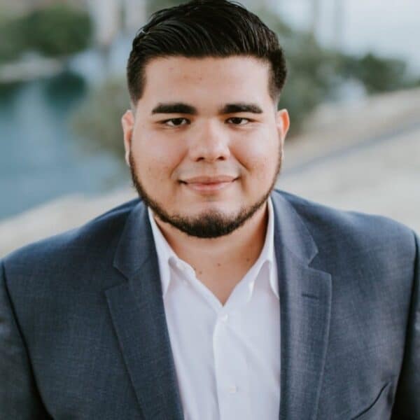 Headshot of Angel Escobedo, CFP®