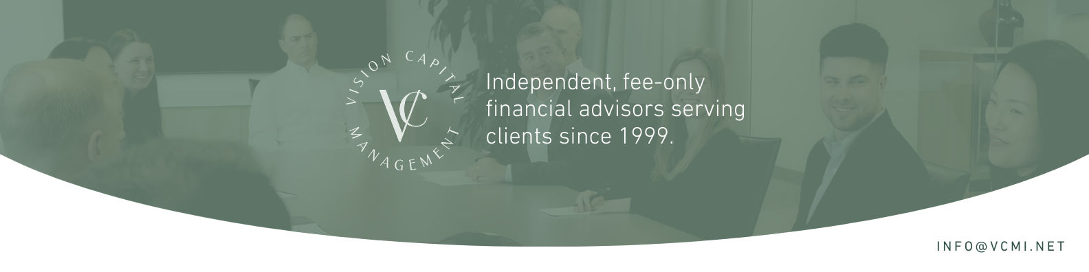 A group of people at a conference table in a meeting room, with the Vision Capital Management logo and text: 