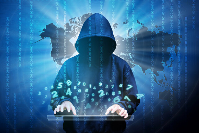 A person in a hooded sweatshirt types on a keyboard with floating numbers, binary code, and a world map in the background, suggesting cybercrime or hacking.