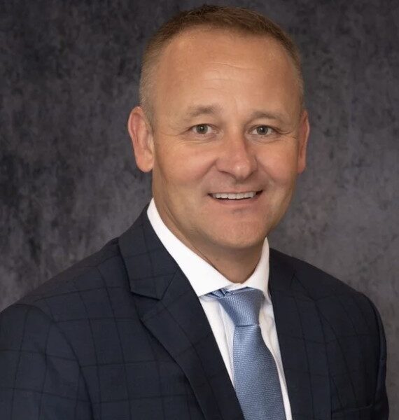 Headshot of Brandon M. Cox, CFP®, CFF®