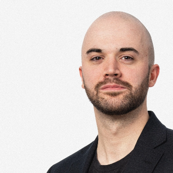 Headshot of Travis Poodiack, CFP®
